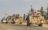 A convoy of US troops outside the Kurdish-majority city of Qamishli, in Syria's northeastern Hasakeh province, November 2, 2019. (Delil Souleiman/AFP)
