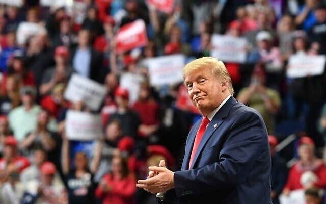 US President Donald Trump claps during a rally at Rupp Arena in Lexington, Kentucky on November 4, 2019. (Mandel Ngan/AFP) US President Donald Trump claps during a rally at Rupp Arena in Lexington, Kentucky on November 4, 2019. (Mandel Ngan/AFP)