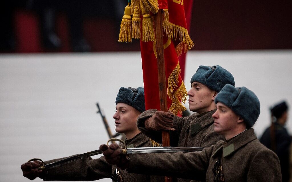 Russian servicemen dressed in historical uniforms march during the military parade at Red Square in Moscow on November 7, 2019, as part of the ceremonies marking the 78th anniversary of the 1941 historical parade, when Red Army soldiers marched past the Kremlin walls towards the front line to fight Nazi Germany troops during World War II. (Dimitar DILKOFF / AFP)