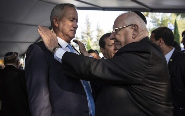 President Reuven Rivlin (R) and Blue and White party chief Benny Gantz at the state memorial ceremony for former Israeli prime minister Yitzhak Rabin, at Mount Herzl cemetery in Jerusalem, November 10, 2019. (Heidi Levine/Pool/AFP) President Reuven Rivlin (R) and Blue and White party chief Benny Gantz at the state memorial ceremony for former Israeli prime minister Yitzhak Rabin, at Mount Herzl cemetery in Jerusalem, November 10, 2019. (Heidi Levine/Pool/AFP)