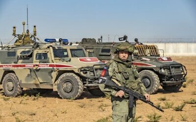 Russian military police take part in a joint Turkish-Russian army patrol near the town of Darbasiyah in Syria's northeastern Hasakeh province, along the Syria-Turkey border, November 11, 2019. (Delil Souleiman/AFP)
