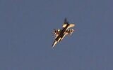 Illustrative: An Israeli F-16 jet is pictured above the southern Israeli city of Ashdod, near the Gaza Strip, on November 12, 2019. (Jack Guez/AFP)