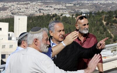 Prime Minister Benjamin Netanyahu (C) meets with heads of Israeli settlement authorities at the Alon Shvut settlement in the Etzion Bloc in the West Bank on November 19, 2019. (Menahem Kahana/AFP)