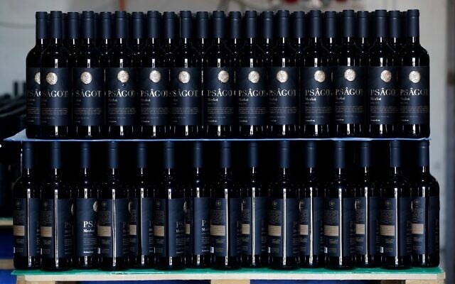 Bottles of wine are set to be shipped at Psagot winery in the Israeli settlement of Psagot adjacent to the Palestinian West Bank city of Ramallah on November 19, 2019. - Berg recently lost a battle against Europe over labelling his wine, so when the United States announced it no longer considered the Israeli settlement he lives illegal he popped open a bottle. (Photo by Emmanuel DUNAND / AFP) Bottles of wine are set to be shipped at Psagot winery in the Israeli settlement of Psagot adjacent to the Palestinian West Bank city of Ramallah on November 19, 2019. - Berg recently lost a battle against Europe over labelling his wine, so when the United States announced it no longer considered the Israeli settlement he lives illegal he popped open a bottle. (Photo by Emmanuel DUNAND / AFP)