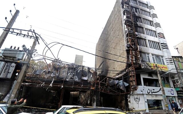 Shops that were destroyed during demonstrations against petrol price hikes, are pictured on November 20, 2019 in Shahriar, west of Tehran. (Atta Kenare/AFP) Shops that were destroyed during demonstrations against petrol price hikes, are pictured on November 20, 2019 in Shahriar, west of Tehran. (Atta Kenare/AFP)