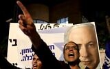 Supporters of Israeli Prime Minister Benjamin Netanyahu chant slogans as they demonstrate their solidarity with him outside his official residency in Jerusalem on November 21, 2019. (GALI TIBBON / AFP)