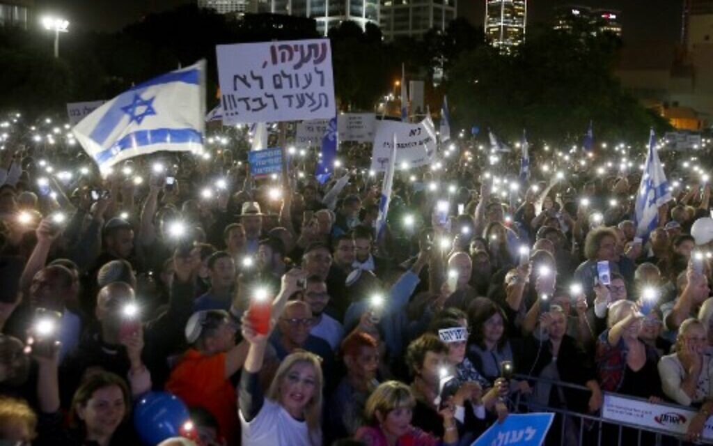 Supporters of Israeli Prime Minister Benjamin Netanyahu at a rally held under the banner 'protesting the coup' in Tel Aviv, on November 26, 2019. (Jack Guez/AFP)