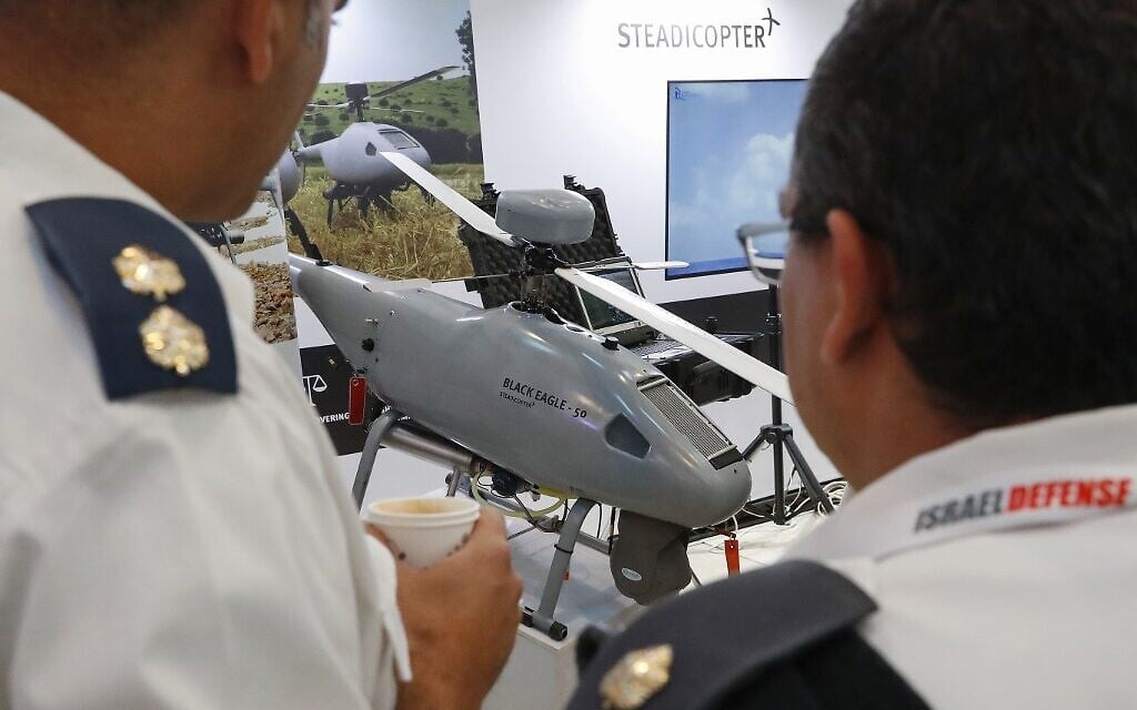 In this photo taken on November 7, 2019, visitors examine exhibits at the 8th International Conference and Exhibition on Unmanned Systems (UVID) at Airport City, near Tel Aviv. (JACK GUEZ / AFP) In this photo taken on November 7, 2019, visitors examine exhibits at the 8th International Conference and Exhibition on Unmanned Systems (UVID) at Airport City, near Tel Aviv. (JACK GUEZ / AFP)