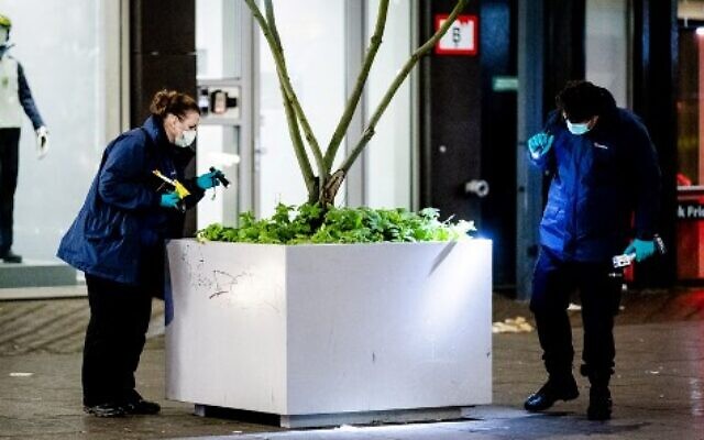 Forensic workers investigate at the Grote Marktstraat, one of the main shopping streets in the center of the Dutch city of The Hague, after several people were wounded in a stabbing incident, November 29, 2019 (Sem Van Der Wal/ANP/AFP) Forensic workers investigate at the Grote Marktstraat, one of the main shopping streets in the center of the Dutch city of The Hague, after several people were wounded in a stabbing incident, November 29, 2019 (Sem Van Der Wal/ANP/AFP)