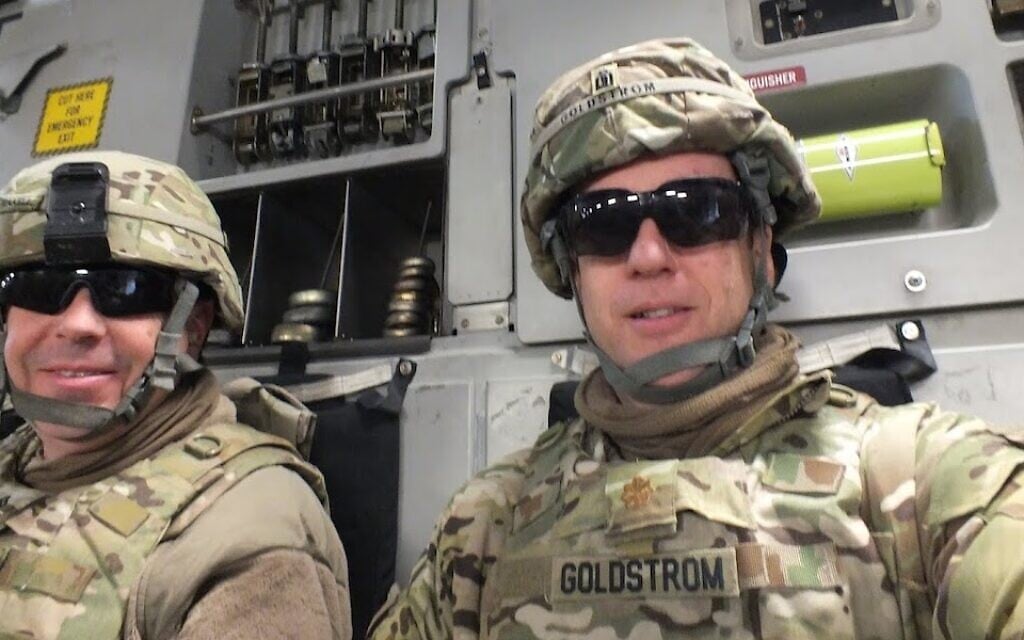 Goldstrom (right) with his chaplain assistant in Afghanistan, Sgt David Teakell, while riding to visit military personnel at other bases and outposts in 2013. (Courtesy of Goldstrom via JTA) Goldstrom (right) with his chaplain assistant in Afghanistan, Sgt David Teakell, while riding to visit military personnel at other bases and outposts in 2013. (Courtesy of Goldstrom via JTA)