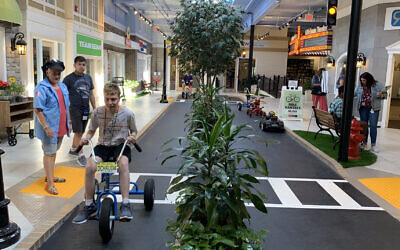 LifeTown Shoppes features 15 storefronts where visitors can practice doing everyday errands. (Josefin Dolsten)