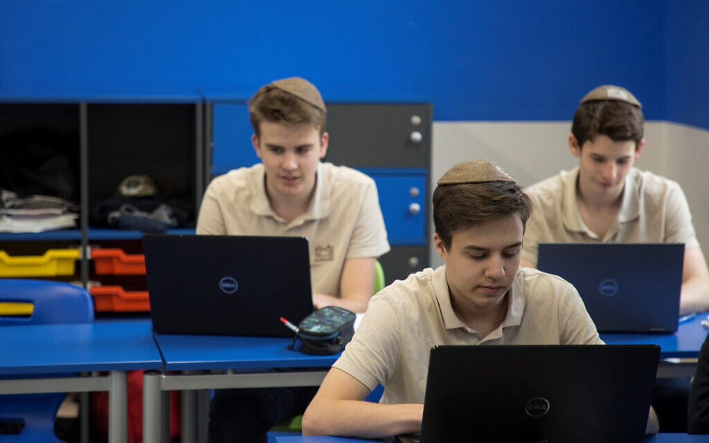 Students doing work at the Maimonides Jewish high school in Budapest, October 7, 2019. (Courtesy of EMIH/via JTA)