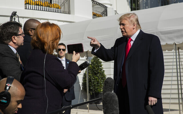 US President Donald Trump speaks to reporters upon arrival at the White House in Washington, Sunday, Nov. 3, 2019. (AP Photo/Manuel Balce Ceneta)