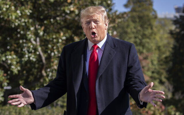 US President Donald Trump speaks to reporters upon arrival at the White House in Washington, November 3, 2019. (AP Photo/Manuel Balce Ceneta) US President Donald Trump speaks to reporters upon arrival at the White House in Washington, November 3, 2019. (AP Photo/Manuel Balce Ceneta)