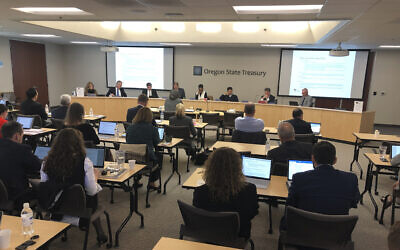 The Oregon Investment Council conducts its monthly meeting in Tigard, Oregon, October 30, 2019. Andrew Selsky/AP)