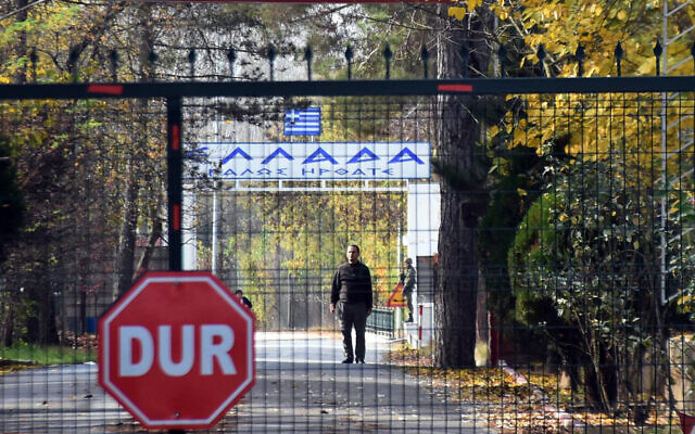 An man who is identified by Turkish news reports as a US citizen who has been deported by Turkey and is now stuck in the heavily militarized no-man's land between Greece and Turkey, after Greece refused to take him in, near Pazarkule border gate, Edirne, Turkey, November 11, 2019. (DHA via AP) An man who is identified by Turkish news reports as a US citizen who has been deported by Turkey and is now stuck in the heavily militarized no-man's land between Greece and Turkey, after Greece refused to take him in, near Pazarkule border gate, Edirne, Turkey, November 11, 2019. (DHA via AP)