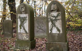 Tombstones vandalized at the Jewish cemetery in Randers, Denmark, November 10, 2019. (Bo Amstrup/Ritzau Scanpix via AP)