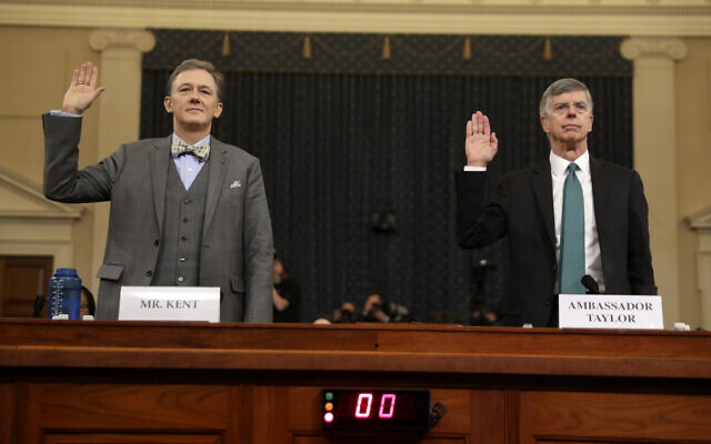 Career Foreign Service officer George Kent and top US diplomat in Ukraine William Taylor, right, are sworn in to testify during the first public impeachment hearing of the House Intelligence Committee on Capitol Hill, November 13, 2019 in Washington. (AP Photo/Andrew Harnik) Career Foreign Service officer George Kent and top US diplomat in Ukraine William Taylor, right, are sworn in to testify during the first public impeachment hearing of the House Intelligence Committee on Capitol Hill, November 13, 2019 in Washington. (AP Photo/Andrew Harnik)