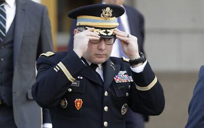 Then National Security Council aide Lt. Col. Alexander Vindman, leaves after testifying before the House Intelligence Committee on Capitol Hill in Washington, November 19, 2019. (Julio Cortez/AP)