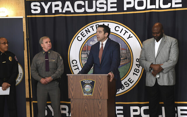 Peter Fitzgerald from the FBI addresses questions about a series of racist messages and hate crimes that have occurred at SU in the previous two weeks during a press conference at the Public Safety Building in Syracuse, New York, November 19, 2019. (Lauren Long/The Syracuse Newspapers via AP) Peter Fitzgerald from the FBI addresses questions about a series of racist messages and hate crimes that have occurred at SU in the previous two weeks during a press conference at the Public Safety Building in Syracuse, New York, November 19, 2019. (Lauren Long/The Syracuse Newspapers via AP)