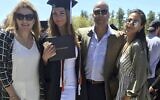 In this May 2019 photo provided by Guila Fakhoury, her father Amer Fakhoury, second from right, gathers with family members at the University of New Hampshire in Durham, New Hampshire. (Guila Fakhoury via AP)