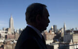 In this Jan. 31, 2008 file photo, New York Mayor Michael Bloomberg is silhouetted against a New York skyline.  (AP Photo/Mark Lennihan, File)