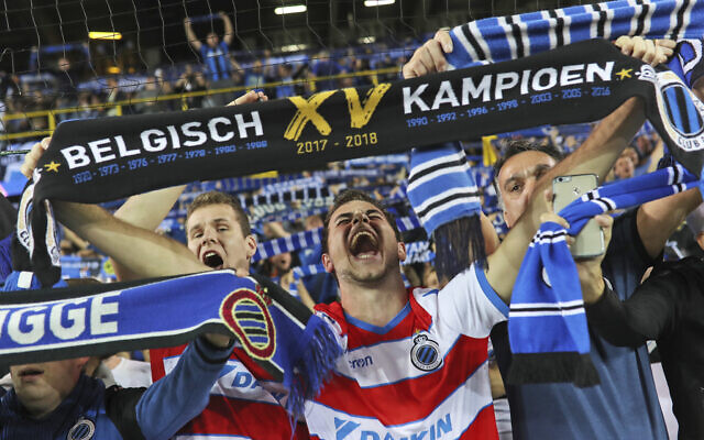 Illustrative: Club Bruges fans cheer prior to a Champions League soccer game at the Jan Breydel Stadium in Bruges, Belgium, September 18, 2018. (Francisco Seco/AP) Illustrative: Club Bruges fans cheer prior to a Champions League soccer game at the Jan Breydel Stadium in Bruges, Belgium, September 18, 2018. (Francisco Seco/AP)