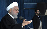 In this photo released by the official website of the office of the Iranian Presidency, President Hassan Rouhani speaks at a public gathering in the city of Rafsanjan in Iran's southwest Kerman province, Monday, November 11, 2019. (Office of the Iranian Presidency via AP)