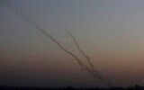 Illustrative: Rockets are launched from the Gaza Strip towards Israel, November 13, 2019. (AP/ Hatem Moussa)