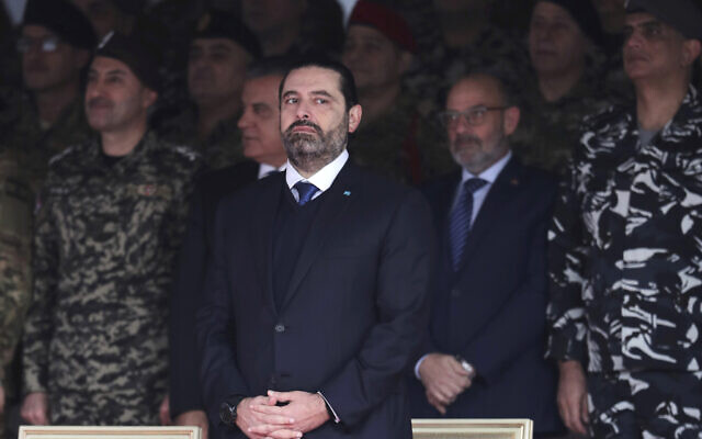 Former Prime Minister Saad Hariri attends a military parade to mark the 76th anniversary of Lebanon's independence from France at the Lebanese Defense Ministry, in Yarzeh near Beirut, Lebanon, November 22, 2019. (AP Photo/Hassan Ammar) Former Prime Minister Saad Hariri attends a military parade to mark the 76th anniversary of Lebanon's independence from France at the Lebanese Defense Ministry, in Yarzeh near Beirut, Lebanon, November 22, 2019. (AP Photo/Hassan Ammar)