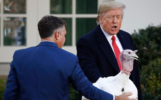 US President Donald Trump pardons Butter, the national Thanksgiving turkey, in the Rose Garden of the White House, November 26, 2019, in Washington. (AP Photo/Patrick Semansky) US President Donald Trump pardons Butter, the national Thanksgiving turkey, in the Rose Garden of the White House, November 26, 2019, in Washington. (AP Photo/Patrick Semansky)