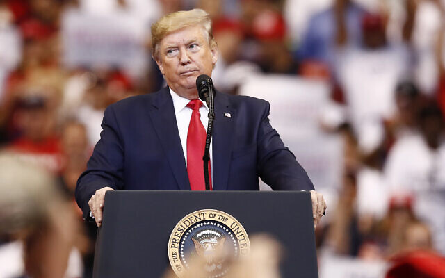 US President Donald Trump speaks during a rally on November 26, 2019, in Sunrise, Florida. (AP Photo/Brynn Anderson) US President Donald Trump speaks during a rally on November 26, 2019, in Sunrise, Florida. (AP Photo/Brynn Anderson)