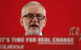 Britain's then-Labour party leader Jeremy Corbyn delivers a speech in London, England, November 27, 2019, ahead of the general election on December 12. (AP Photo/Frank Augstein)