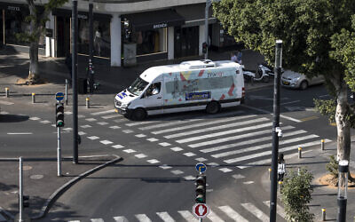 A public transport minibus drives through central Tel Aviv on Saturday, November 23, 2019. (Tsafrir Abayov/AP)
