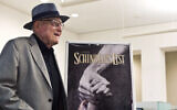 Croatian Auschwitz survivor Branko Lustig stands next to a poster of the film Schindler's List at Yad Vashem Holocaust memorial in Jerusalem, July 22, 2015. (Nir Elias/Pool Photo via AP)