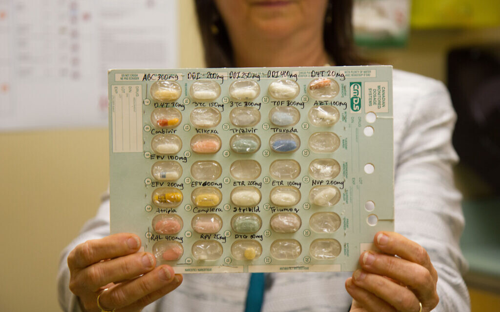 Dr. Neora Pick holds a selection of antiretroviral medications for HIV positive patients at the Oak Tree Clinic. (Etye Sarner)