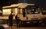 Illustrative: A bus of the Israeli Prison Service transporting prisoners, December 18, 2011. (Uri Lenz/FLASH90)