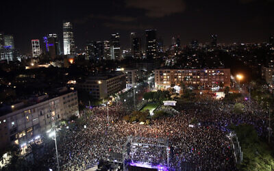 Israelis attend a rally marking 24 years since the assassination of late Israeli Prime Minister Yitzhak Rabin, at Tel Aviv's Rabin Square on November 2, 2019 (Miriam Alster/Flash90)