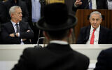 Prime Minister Benjamin Netanyahu (R), and Blue and White leader Benny Gantz, at a ceremony marking six years since the death of Rabbi Ovadia Yosef, at the Knesset, November 4, 2019. (Hadas Parush/Flash90)