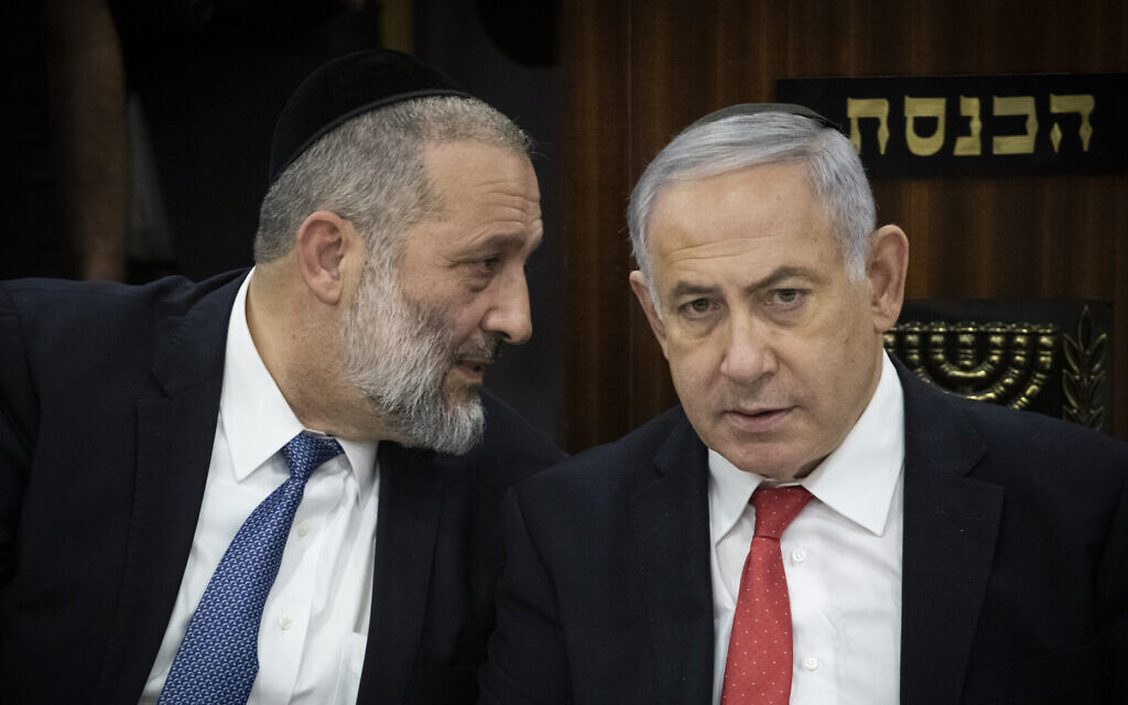 Interior Minister Aryeh Deri (L) and Prime Minister Benjamin Netanyahu at a ceremony marking the six-year anniversary of death of Rabbi Ovadia Yosef, at the Knesset, November 4, 2019. (Hadas Parush/Flash90) Interior Minister Aryeh Deri (L) and Prime Minister Benjamin Netanyahu at a ceremony marking the six-year anniversary of death of Rabbi Ovadia Yosef, at the Knesset, November 4, 2019. (Hadas Parush/Flash90)
