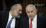 Interior Minister Aryeh Deri (L) and Prime Minister Benjamin Netanyahu at a ceremony marking the six-year anniversary of death of Rabbi Ovadia Yosef, at the Knesset, November 4, 2019. (Hadas Parush/Flash90)