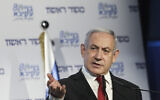 Prime Minister Benjamin Netanyahu speaks at a conference organized by the Makor Rishon newspaper and the Bnei Akiva youth movement at the International Convention Center in Jerusalem, November 11, 2019. (Noam Revkin Fenton/Flash90)