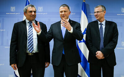 Then-Knesset speaker Yuli Edelstein, center, with Then-Likud ministers and coalition negotiators Ze'ev Elkin, left, and Yariv Levin on November 27, 2019. (Flash90)