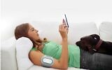 The Nerivio device developed by Theranica Bioelectronics is worn on the upper arm to stimulate the body's neural pathway and fight migraine pain. (Courtesy)