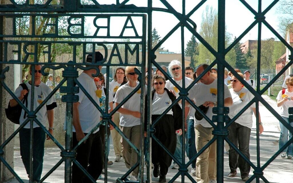 Holocaust survivor Rose Price, center, is the first to approach the gates of the Dachau concentration camp on the first March of Life, in 2007. (Courtesy)