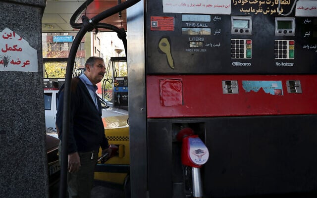 A taxi driver fills his car at a gas station in Tehran, Iran, November 15, 2019. Authorities have imposed rationing and increased the prices of fuel. (AP Photo/Vahid Salemi) A taxi driver fills his car at a gas station in Tehran, Iran, November 15, 2019. Authorities have imposed rationing and increased the prices of fuel. (AP Photo/Vahid Salemi)