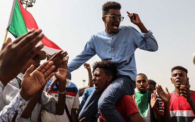 People take part in a protest in Khartoum, Sudan, July 18, 2019. (AP Photo/Mahmoud Hjaj)