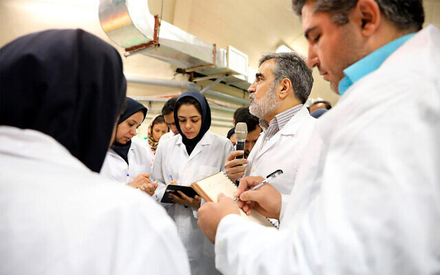In this photo released by the Atomic Energy Organization of Iran, spokesman of the organization Behrouz Kamalvandi, center, briefs the media while visiting Fordo nuclear site near Qom, south of Tehran, Iran, November 9, 2019. (Atomic Energy Organization of Iran via AP) In this photo released by the Atomic Energy Organization of Iran, spokesman of the organization Behrouz Kamalvandi, center, briefs the media while visiting Fordo nuclear site near Qom, south of Tehran, Iran, November 9, 2019. (Atomic Energy Organization of Iran via AP)
