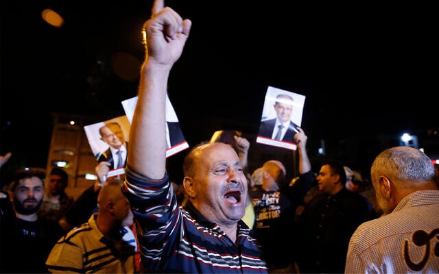 Supporters of Lebanese President Michel Aoun during a protest near the presidential palace in the Beirut suburb of Baabda, Lebanon, November 26, 2019. (AP Photo/Bilal Hussein) Supporters of Lebanese President Michel Aoun during a protest near the presidential palace in the Beirut suburb of Baabda, Lebanon, November 26, 2019. (AP Photo/Bilal Hussein)