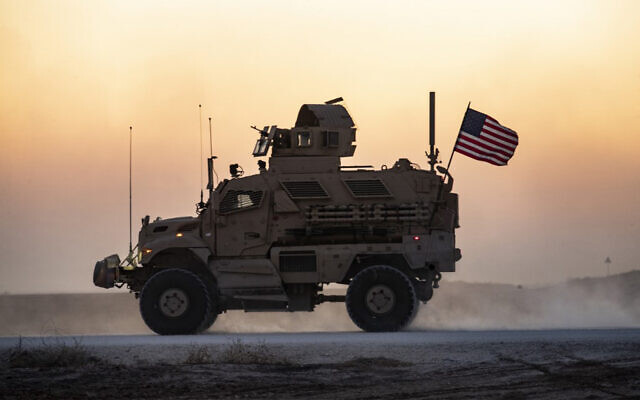 A US military vehicle, part of a convoy, drives near the town of Tal Tamr in the northeastern Syrian Hasakeh province on the border with Turkey, November 10, 2019. (Delil Souleiman/AFP) A US military vehicle, part of a convoy, drives near the town of Tal Tamr in the northeastern Syrian Hasakeh province on the border with Turkey, November 10, 2019. (Delil Souleiman/AFP)